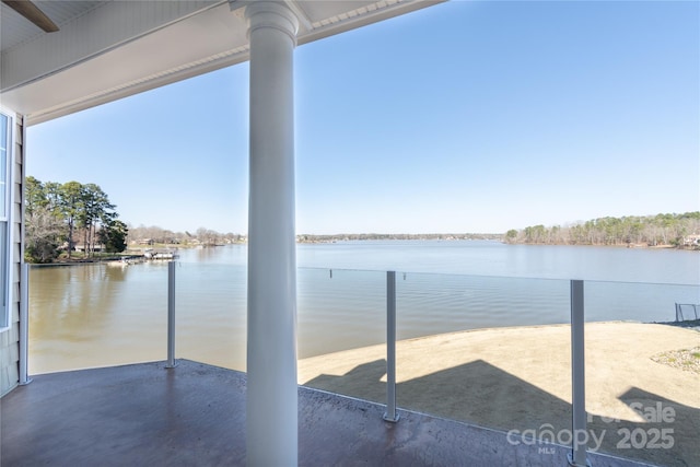 view of patio featuring a water view