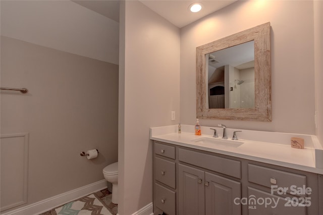 full bath with recessed lighting, toilet, vanity, and baseboards