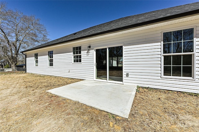 rear view of house with a patio