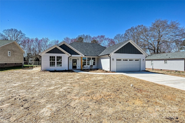 view of front of home featuring driveway, a garage, and board and batten siding