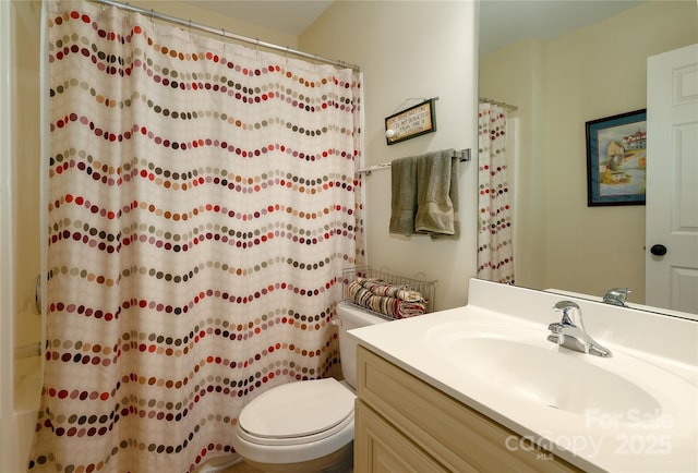 bathroom with vanity, toilet, and a shower with curtain