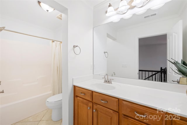 bathroom featuring vanity, visible vents, ornamental molding, tile patterned flooring, and toilet