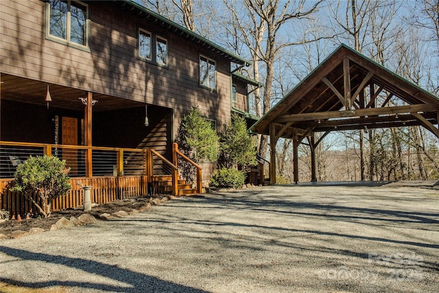 exterior space featuring gravel driveway