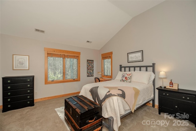 bedroom with visible vents, high vaulted ceiling, baseboards, and carpet floors