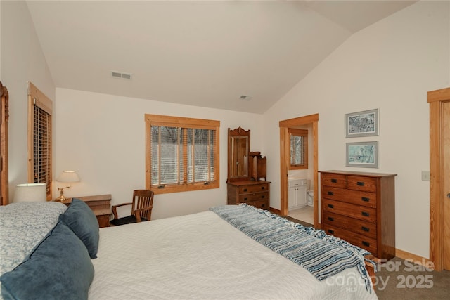 bedroom featuring visible vents, carpet flooring, baseboards, and lofted ceiling