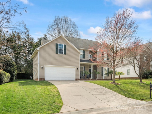 traditional home with a garage, driveway, and a front yard