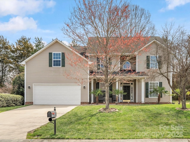 traditional-style home with a front yard, covered porch, driveway, and an attached garage