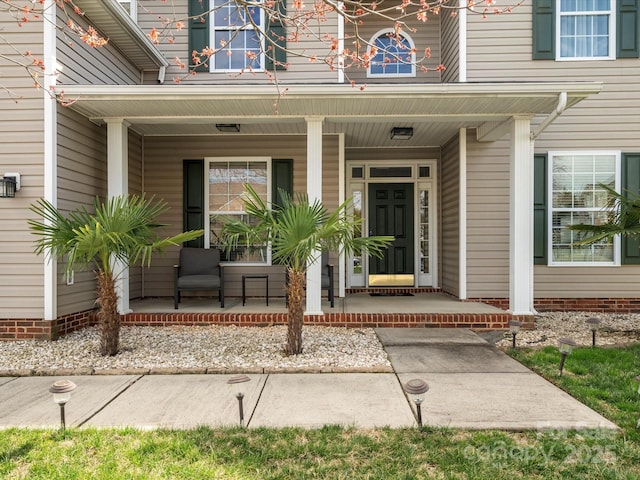 entrance to property with covered porch