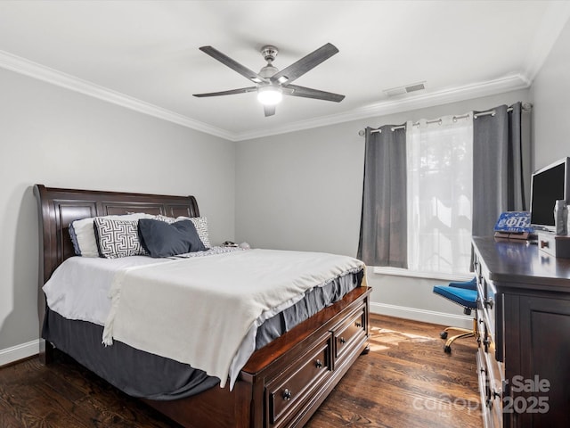 bedroom with visible vents, a ceiling fan, baseboards, dark wood finished floors, and crown molding