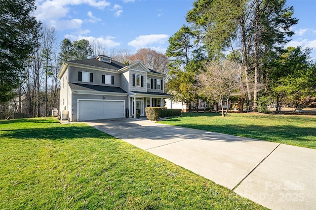 traditional-style home with driveway, a front yard, and an attached garage