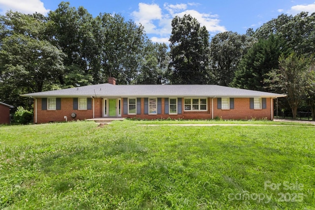 1210 Brookwood Dr, Shelby, NC 28150 - ranch-style house featuring a front lawn, brick siding, and a chimney