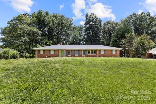 1210 Brookwood Dr, Shelby, NC 28150 - ranch-style house with a front yard, brick siding, and a chimney