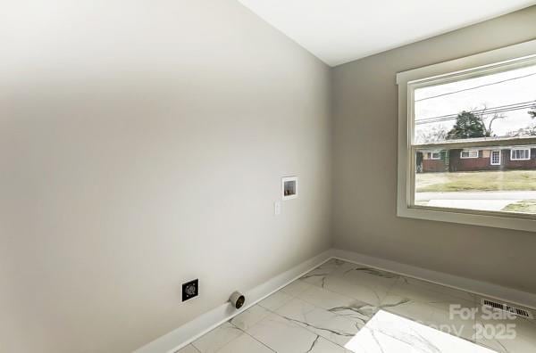 laundry area with washer hookup, marble finish floor, visible vents, laundry area, and baseboards