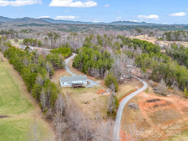 drone / aerial view featuring a mountain view