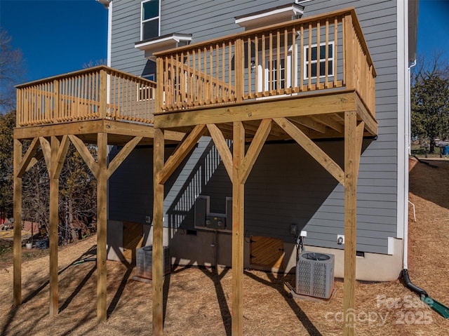 view of patio / terrace featuring a deck and cooling unit