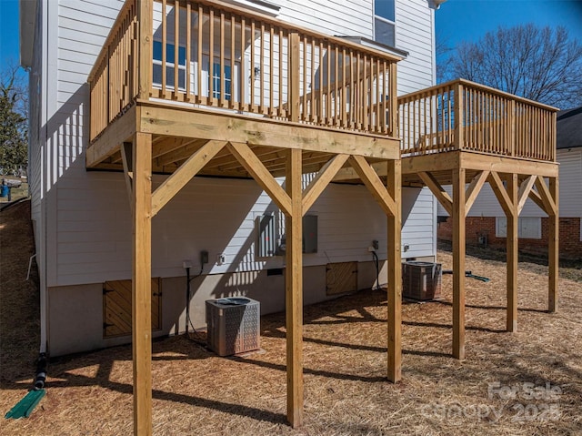 view of playground featuring a deck and cooling unit