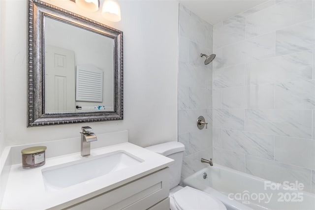 full bath featuring toilet, shower / bathing tub combination, and vanity