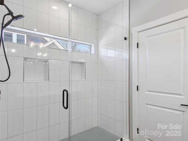 full bath featuring a stall shower