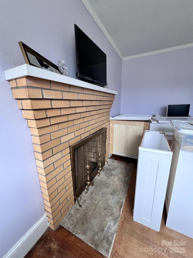 930 Weaver Rd, China Grove, NC 28023 - interior space featuring a brick fireplace, baseboards, ornamental molding, and wood finished floors