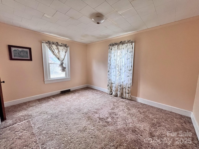 930 Weaver Rd, China Grove, NC 28023 - carpeted empty room featuring baseboards, visible vents, and crown molding