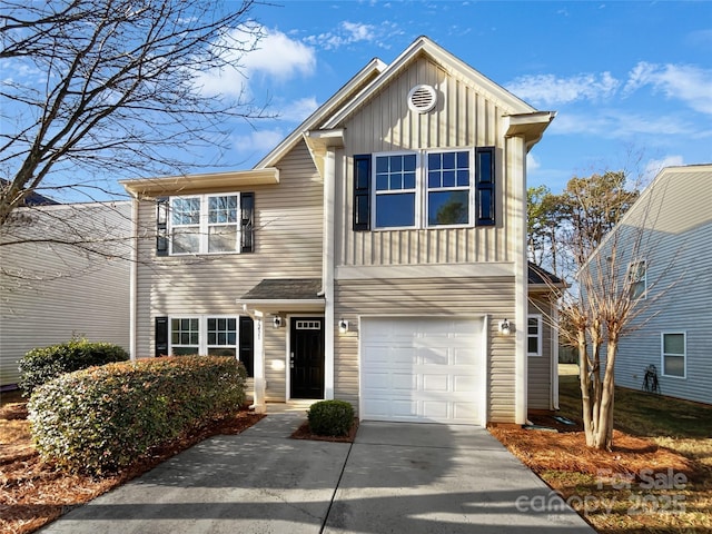 traditional-style home with an attached garage, board and batten siding, and concrete driveway