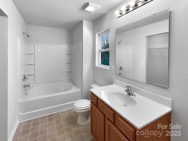 full bath with vanity, shower / tub combination, and toilet