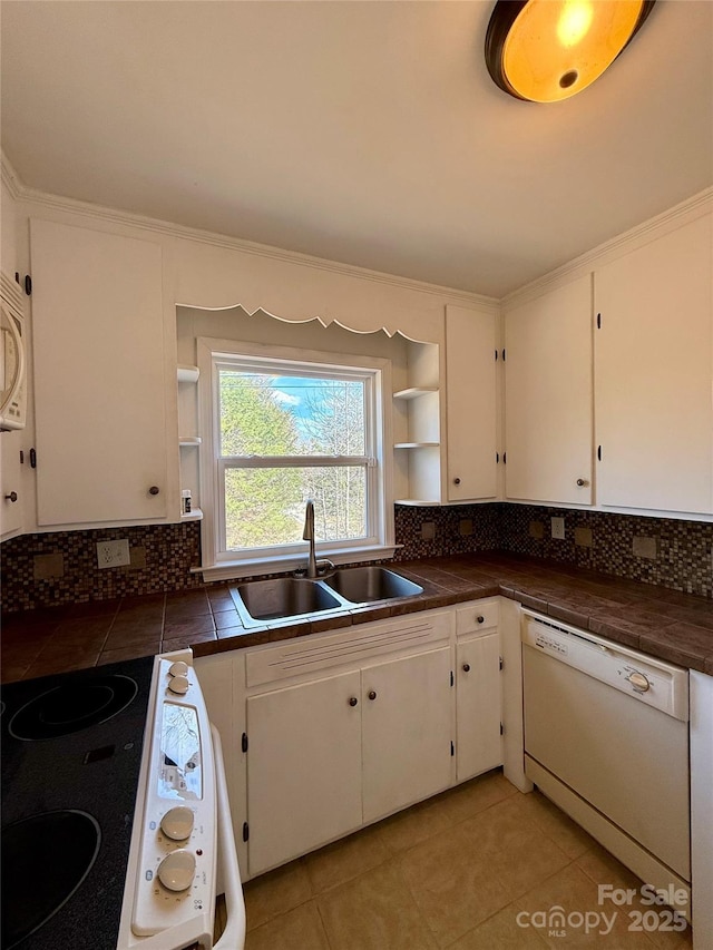 kitchen featuring white appliances, white cabinetry, open shelves, and a sink