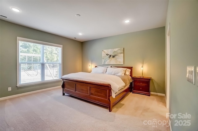 carpeted bedroom featuring visible vents, recessed lighting, and baseboards