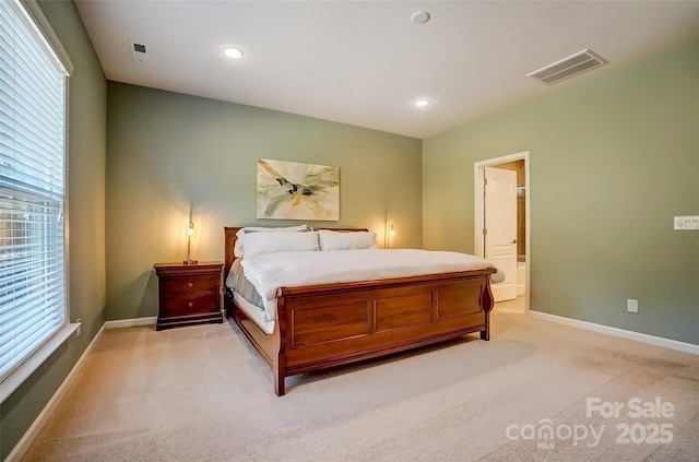 bedroom featuring light colored carpet, recessed lighting, baseboards, and visible vents