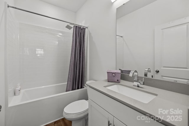 bathroom with toilet, shower / tub combo, wood finished floors, and vanity