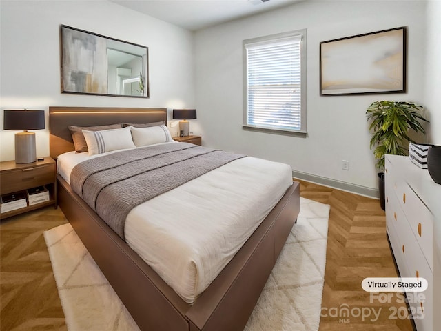 bedroom with baseboards