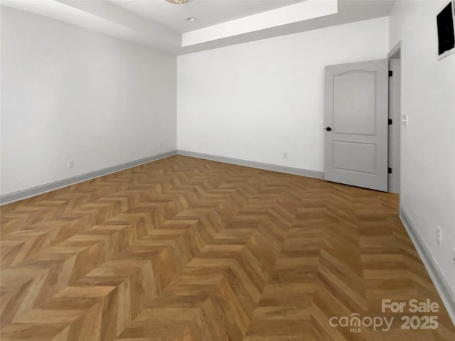 empty room with baseboards