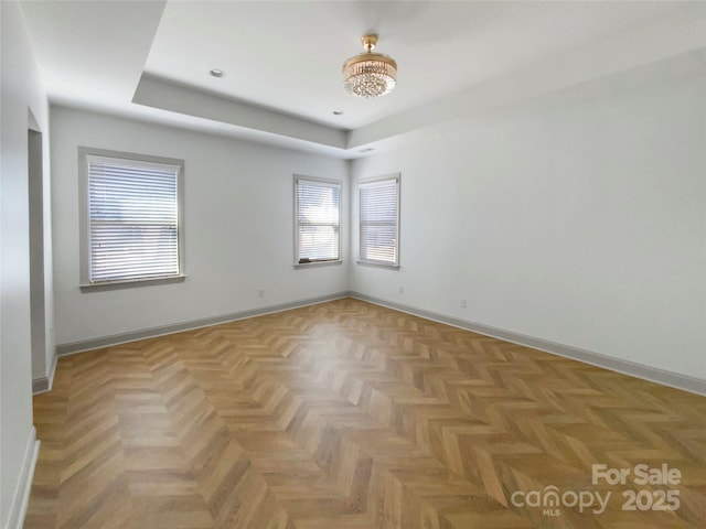 empty room with baseboards