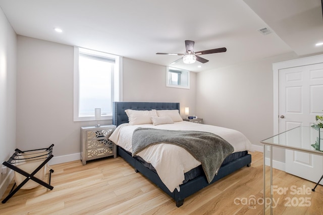 bedroom featuring recessed lighting, baseboards, light wood-style floors, and visible vents