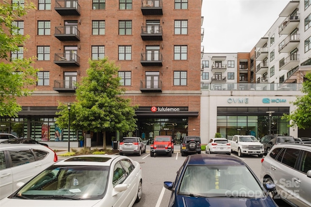 1937 Wilmore Dr, Charlotte, NC 28203 - view of apartment building / complex with uncovered parking