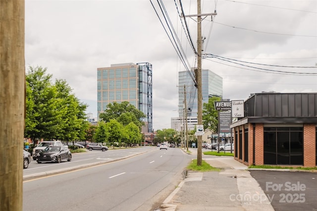1937 Wilmore Dr, Charlotte, NC 28203 - view of asphalt road featuring sidewalks and curbs