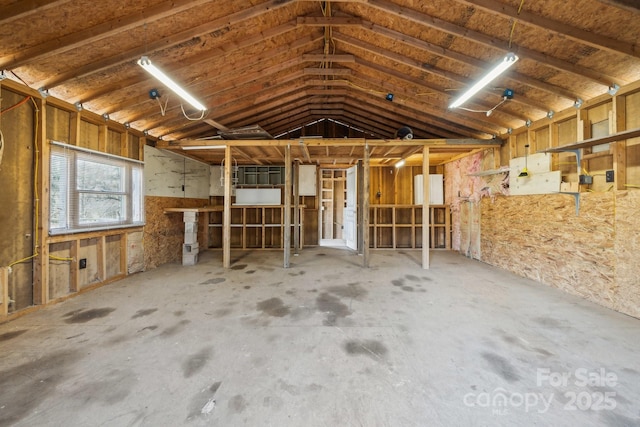 miscellaneous room featuring lofted ceiling