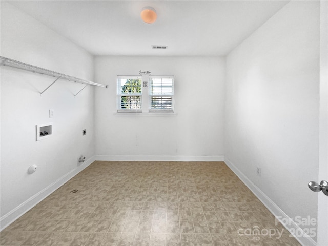 laundry area with hookup for a washing machine, visible vents, electric dryer hookup, laundry area, and baseboards