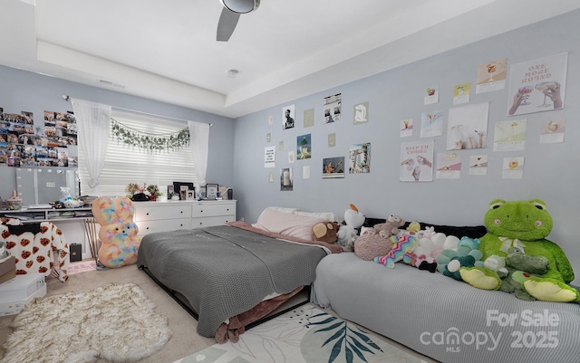 bedroom with ceiling fan and visible vents