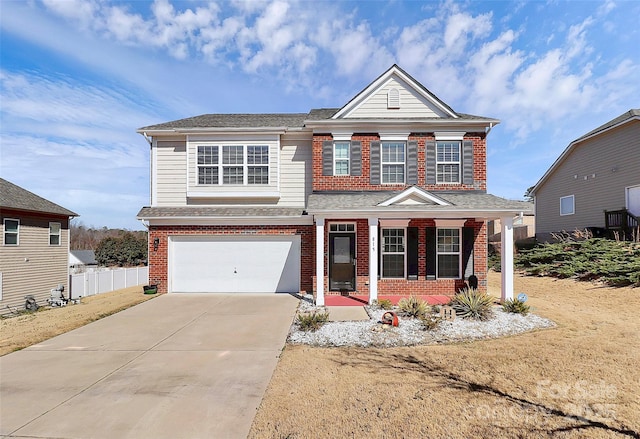 view of front of home featuring a garage, concrete driveway, covered porch, fence, and brick siding