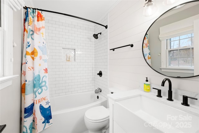 bathroom with shower / tub combo, vanity, and toilet