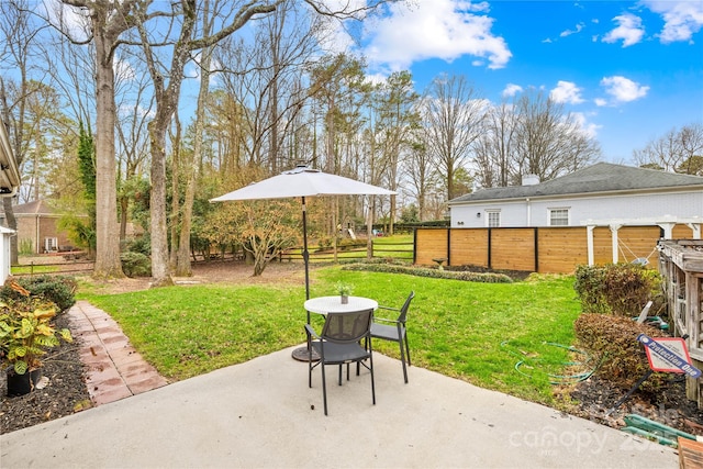 view of patio with fence