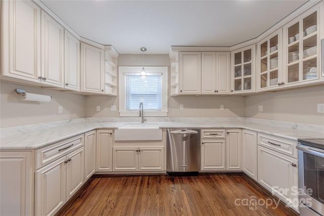 kitchen featuring open shelves, a sink, dark wood-type flooring, glass insert cabinets, and appliances with stainless steel finishes