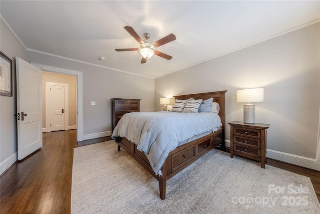 bedroom featuring baseboards, a ceiling fan, wood finished floors, and crown molding