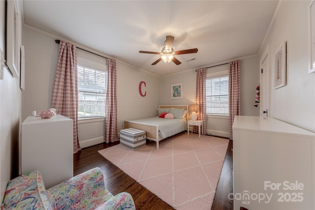 bedroom with a ceiling fan, visible vents, light wood-style floors, and baseboards