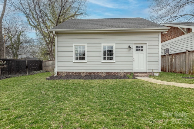 exterior space with a fenced backyard