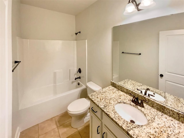 bathroom featuring vanity, tub / shower combination, tile patterned flooring, and toilet