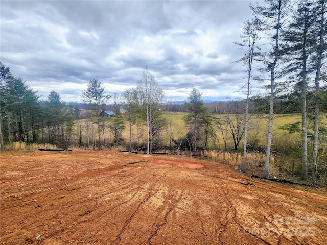 exterior space with a rural view