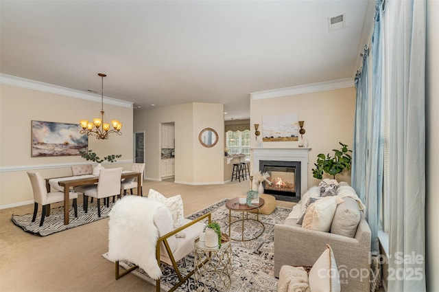 living area featuring visible vents, baseboards, light colored carpet, an inviting chandelier, and a glass covered fireplace