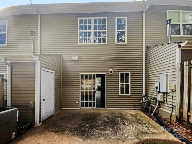 rear view of house with a patio